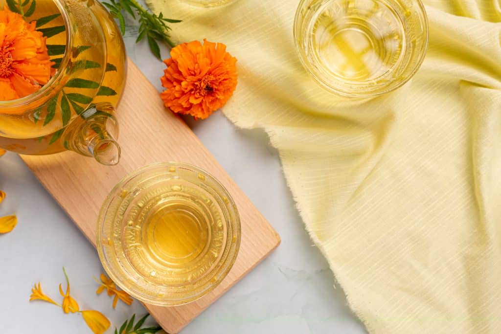 marigold lemon honey herbal tea treatment concept